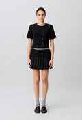 Short pleated peplum dress