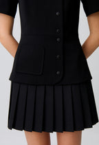 Short pleated peplum dress