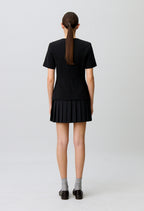 Short pleated peplum dress